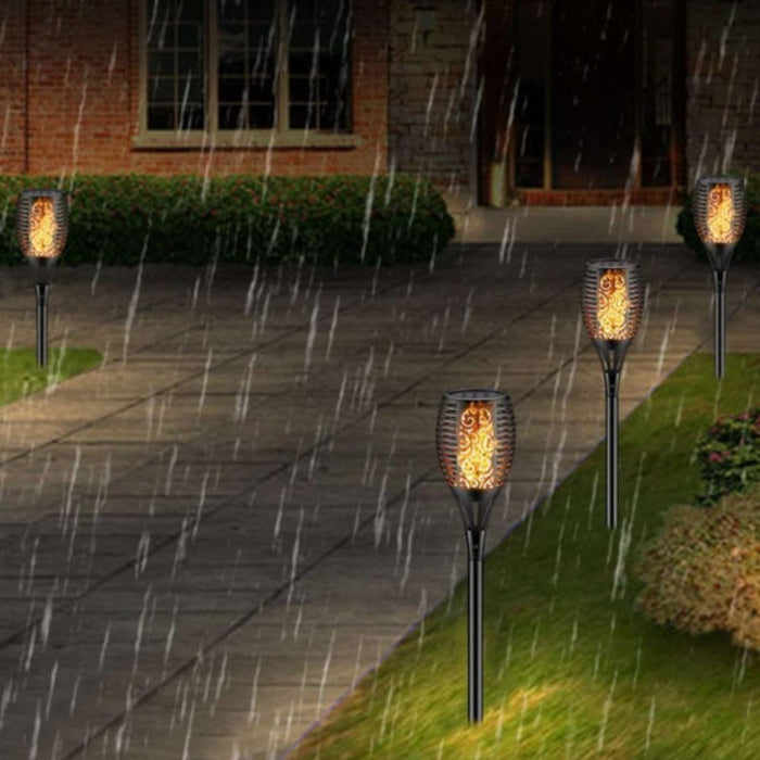 Solar_llama_luz_alairelibre_parpadeo_lampara_baile_luz_impermeable_paisaje_noche_luz_jardin_luz_cesped_patio_camino_bronmart